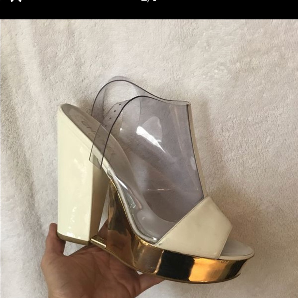 Authentic Chanel  white patent leather and gold